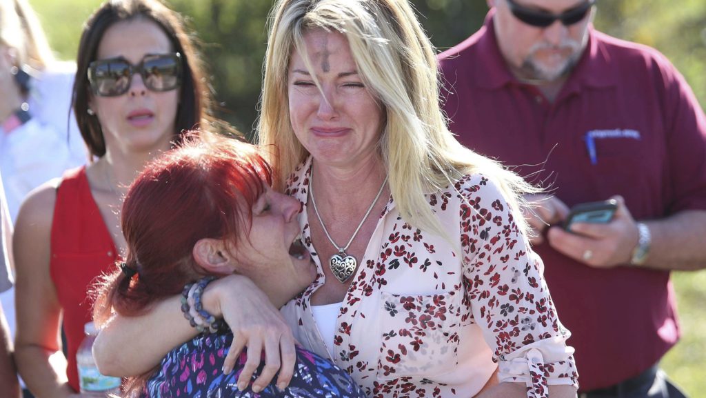 Undying sorrow.(AP Photo/Joel Auerbach)